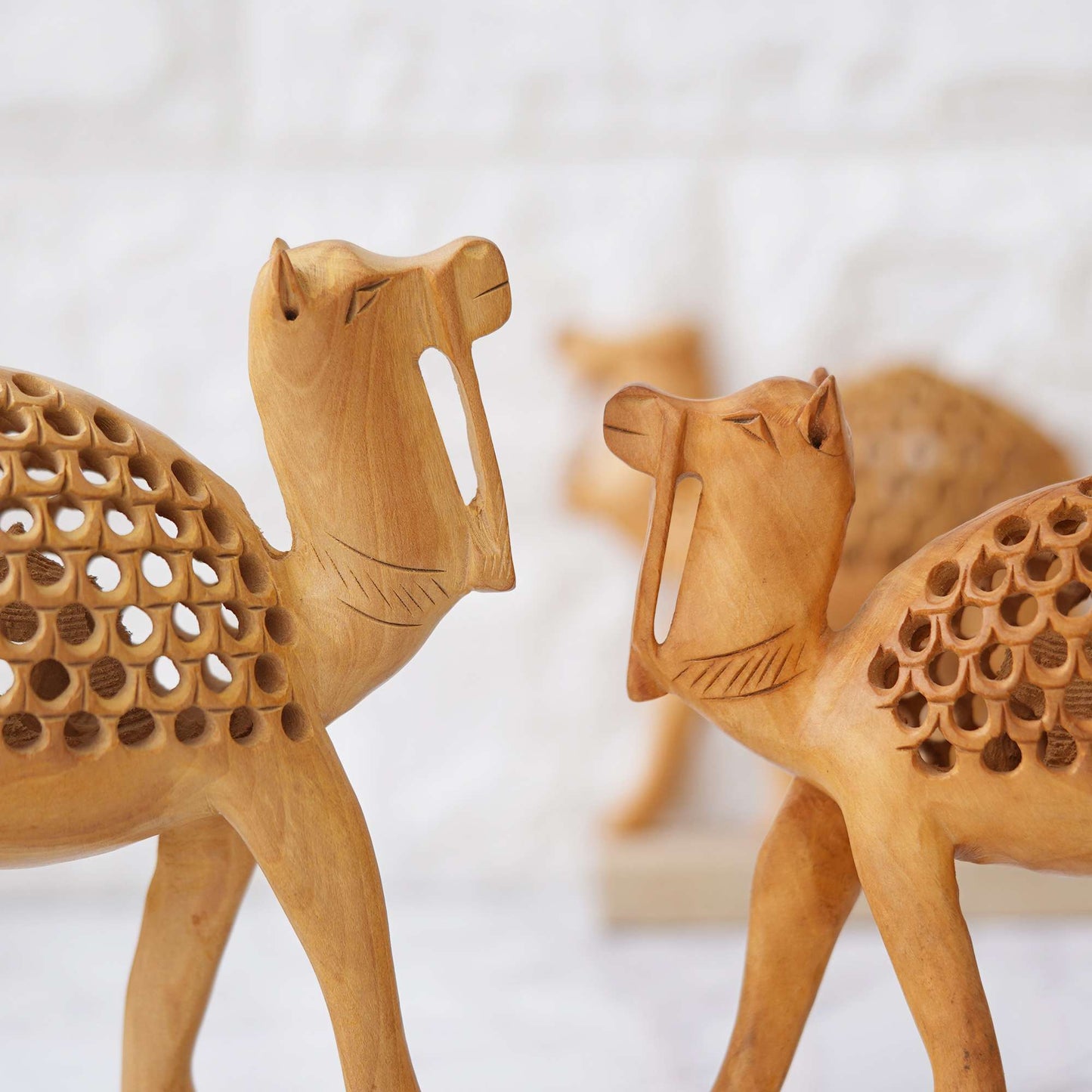 Handcrafted Wooden Camel Set – Intricate Jali Work Décor from Rajasthan