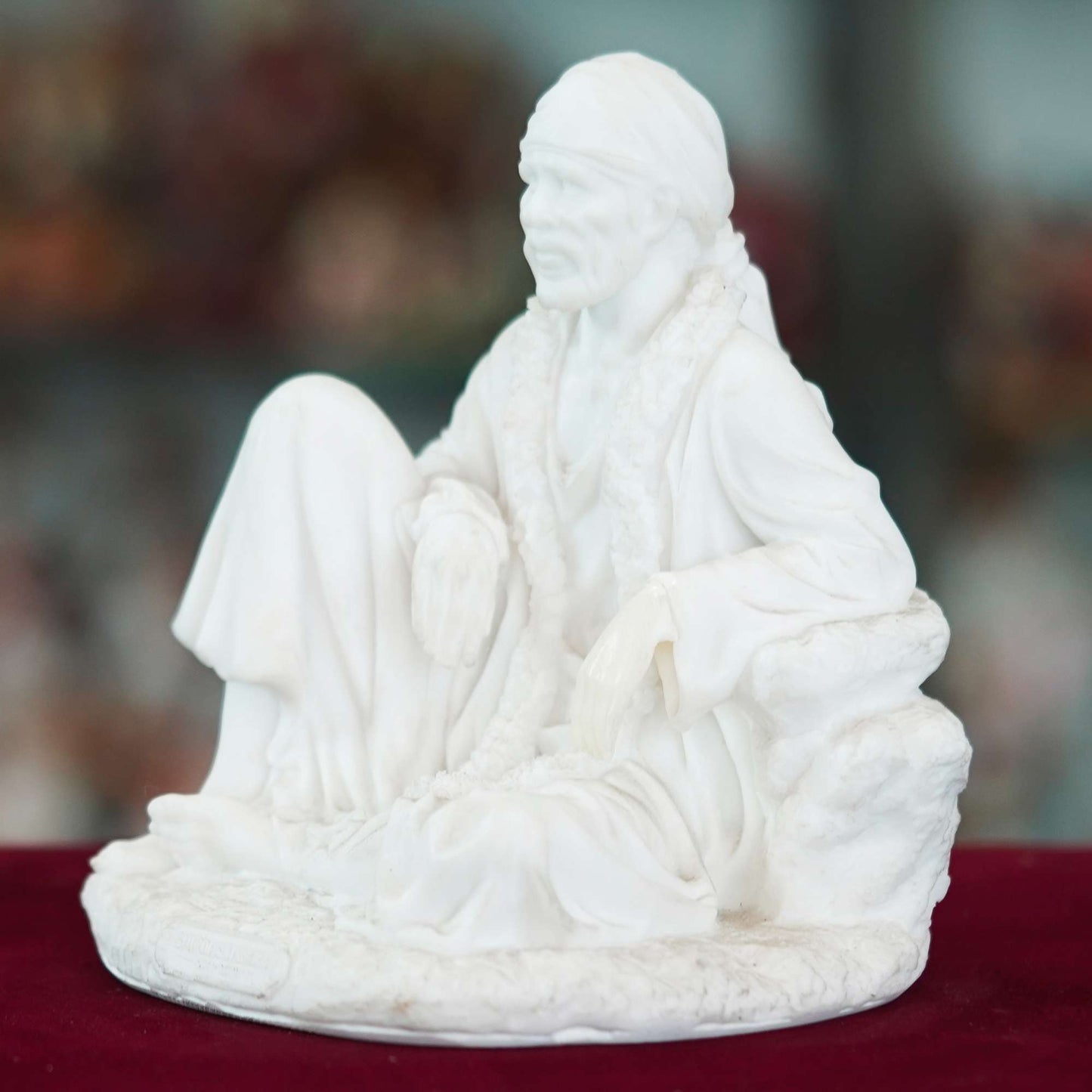 Divine Sai Baba Idol – White Marble Finish Spiritual Figurine for Home and Temple