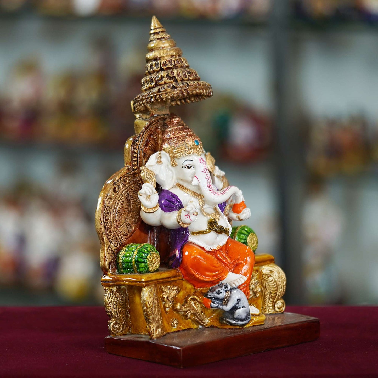 Majestic Lord Ganesha Idol Seated on Throne – Vibrant Hand-Painted Decorative Statue