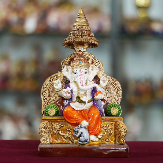 Majestic Lord Ganesha Idol Seated on Throne – Vibrant Hand-Painted Decorative Statue